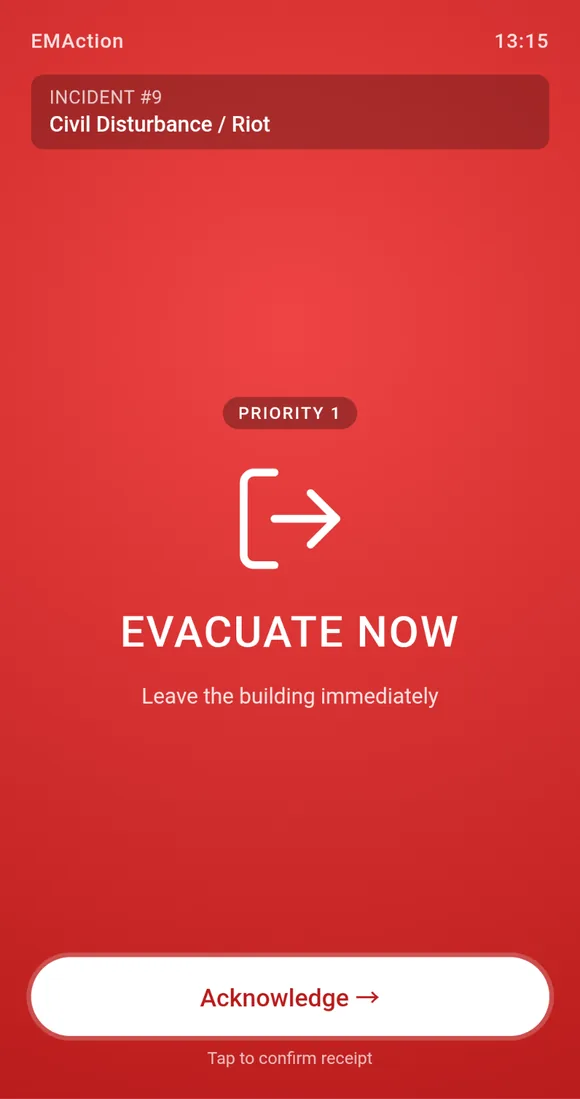 Evacuate Now broadcast instruction on a staff phone, with a Priority 1 badge and an Acknowledge button