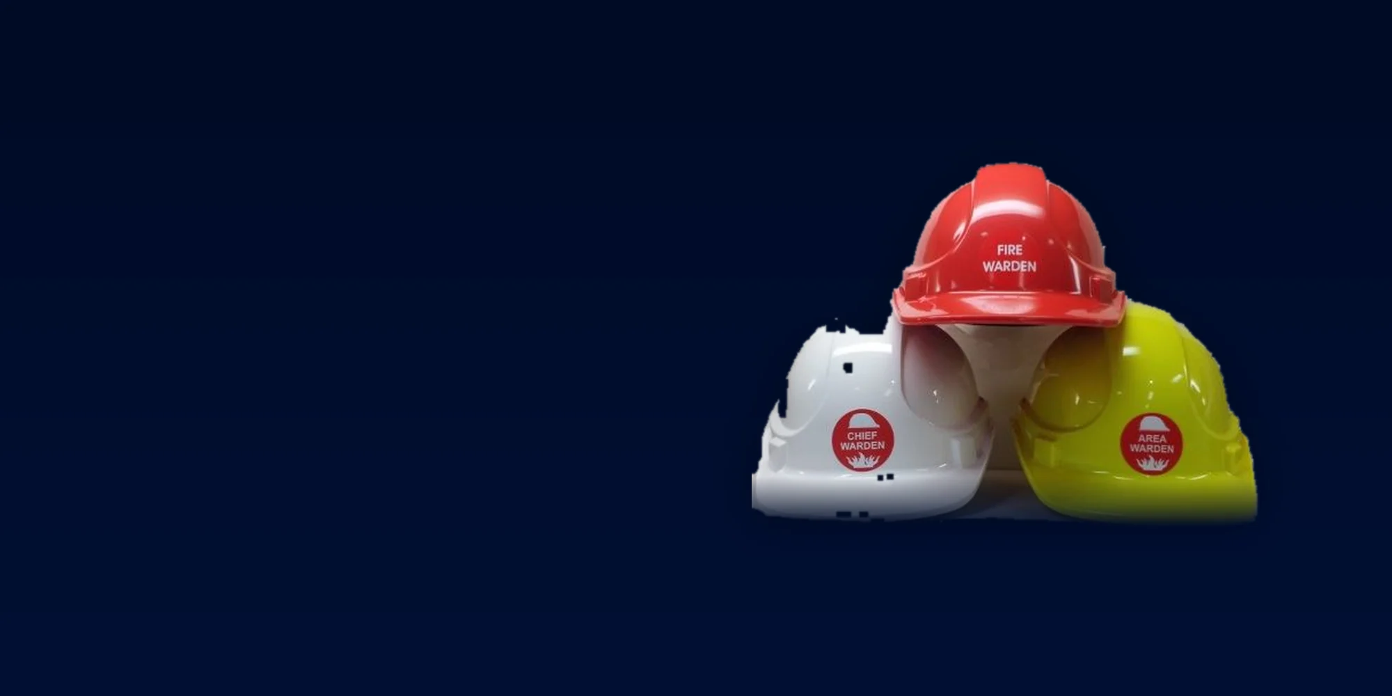 Three emergency warden helmets — red Fire Warden, white Chief Warden and yellow Area Warden